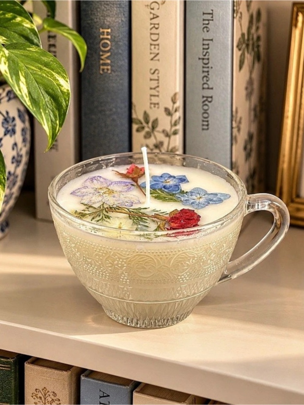 A beautiful one-of-a-kind Gardenia soy candle, hand-poured into an elegant clear
